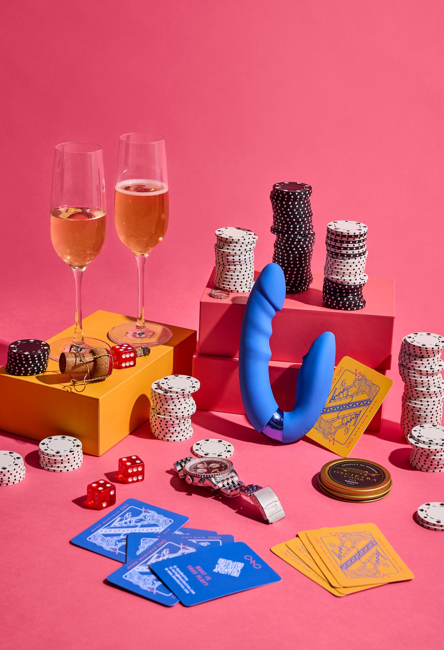 Poker-themed items including cards, chips, dice, and champagne on a pink background